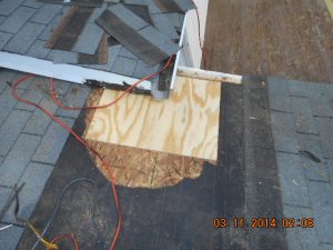 Roof repair on a Maryland foreclosed home