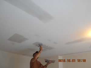 patching drywall in a Maryland foreclosed home
